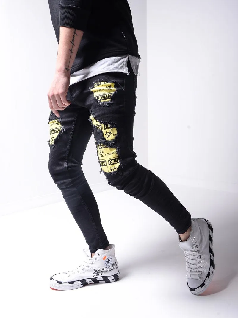 Biohazard Ripped Jeans