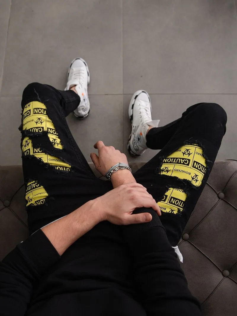 Biohazard Ripped Jeans