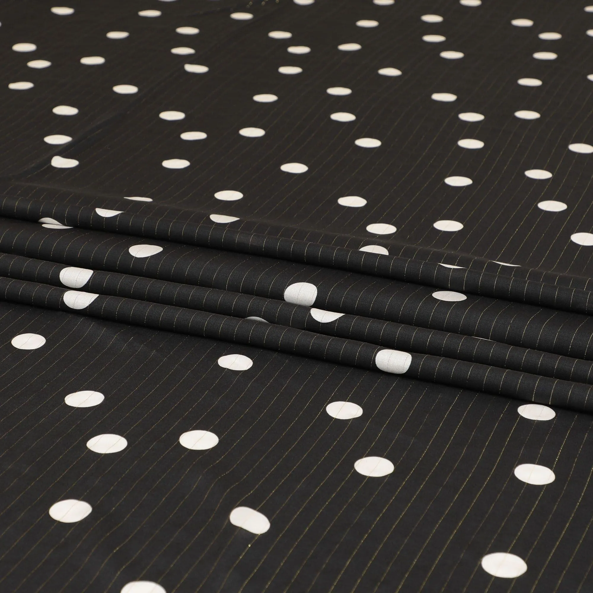 Black Italian viscose crepe fabric with off white print having gold metallic lurex stripe in Polka dot design-D7807